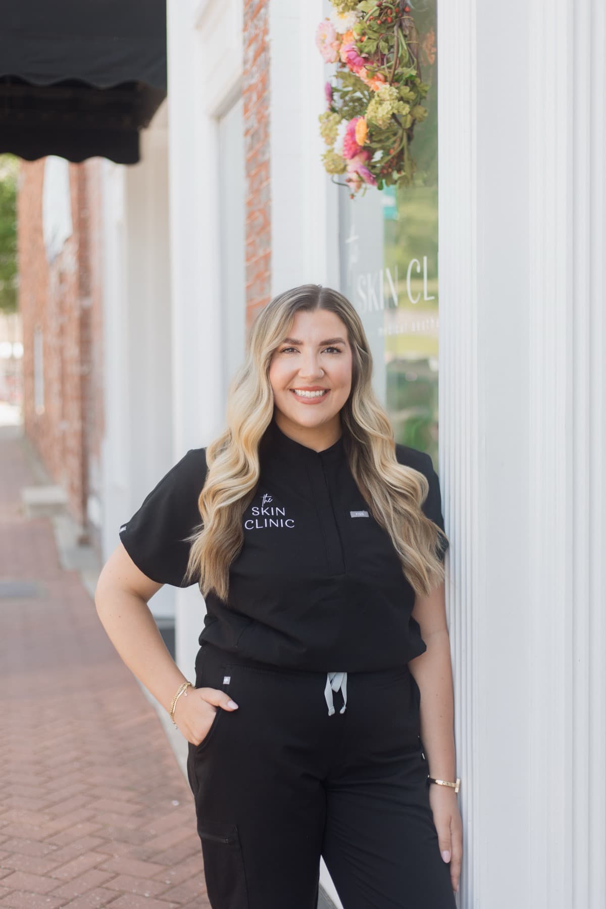 A team member outside the clinic